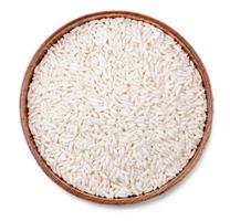 White rice in wooden bowl isolated on white background with clipping path photo