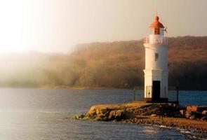 Lighthouse Tokarevskaya koshka with vane anemometer in Vladivostok, Russia photo