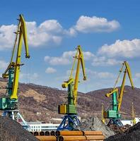 crane at the scrapyard in the seaport photo