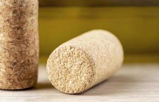 The Wine corks on wooden background photo