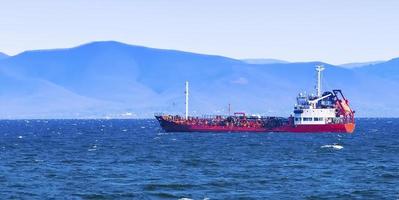 bulk cargo ship to harbor quayside Vladivostok photo
