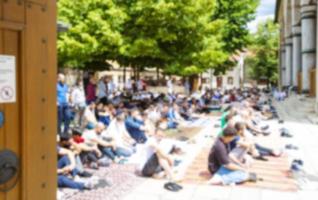 Defocused people prayer in mosque. Blurred images of prayers at mosques photo