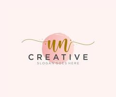 initial UN Feminine logo beauty monogram and elegant logo design, handwriting logo of initial signature, wedding, fashion, floral and botanical with creative template. vector