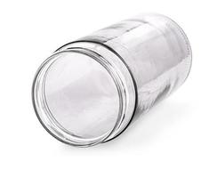glass empty jar on the side isolated on white background photo
