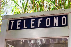 Fragment of telephone box in Barcelona, Spain photo