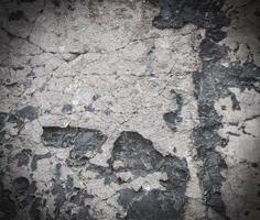 Background of a concrete slab with cracked paint. photo
