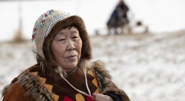 woman in traditional Koryak dress on holiday Northern aboriginal Koryak was Hololo. photo