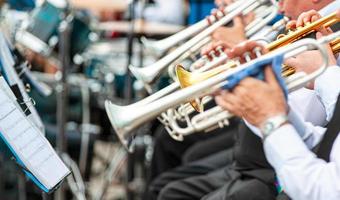 Selective focus. Musicians playing in outerwear on the street photo