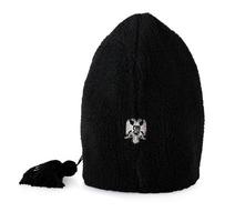 Traditional fur military ethnic hat with Serbian coat of arms isolated photo