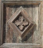 old wooden texture with ornament. Selective focus photo
