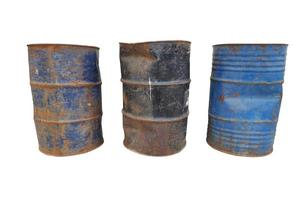 Rusty and deformed metal barrels