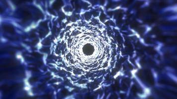 Abstract blue tunnel swirling from lines and particles of triangles glowing futuristic hi-tech with a blur effect on a dark background. Abstract background. Video in high quality 4k, motion design