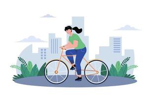 niña montando en bicicleta en la calle vector