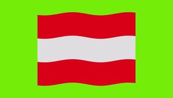 Flagge Österreichs Fahnenschwingen auf grünem Hintergrund video