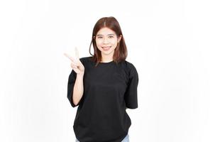 Showing Peace Sign and Smile Of Beautiful Asian Woman Isolated On White Background photo