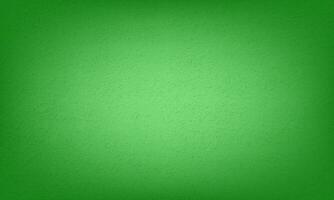 Abstract grungy forest green gradient color stucco wall background photo