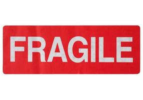 Signo de etiqueta de signo frágil aislado sobre blanco foto