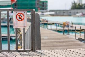 No entry warning sign danger zone in airport, seaplane rotor, authorized personnel only, restricted area. Maldives Male airport photo