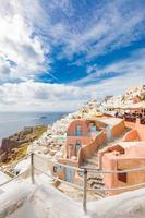 White architecture on Santorini island, Greece. Beautiful summer landscape, sea view. Oia village, amazing scenery and vacation mood, wonderful holiday concept. Idyllic travel background photo