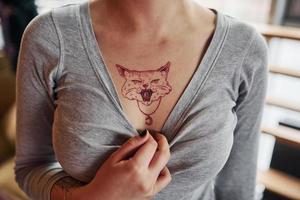 Cat chest tattoo photo