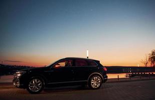 Car by the sunset photo