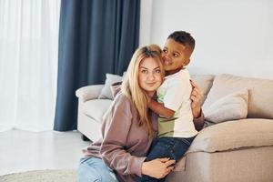 Mixed race family together photo