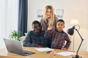 Mixed race family together photo