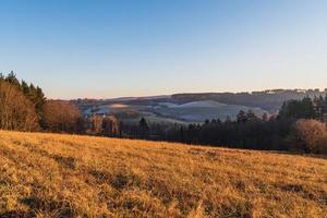 Rural landscape with meadow in autumn photo