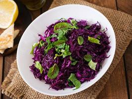 Salad of red cabbage with herbs photo