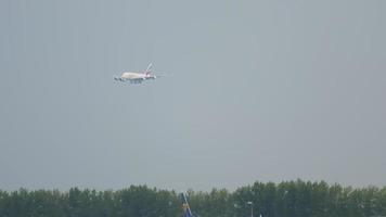 AMSTERDAM, THE NETHERLANDS JULY 24, 2017 - Emirates Airbus 380 A6 EUN approaching before landing at runway 36R Aalsmeerbaan. Shiphol Airport, Amsterdam, Holland video