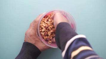 Top View Of Holding A Peanut Butter Container video