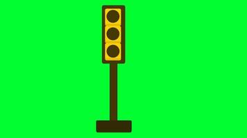 feu de signalisation changeant la couleur de la lumière des lampes du rouge au jaune au vert. stop wait and go signal lumineux pour véhicule et vélos. feu de circulation changeant sur écran vert adapté à l'éducation. video