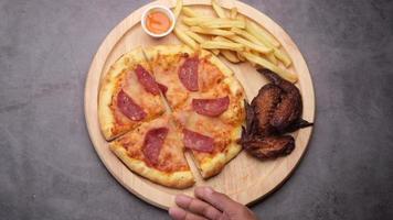 French Fries , Pizza And Sauce On A Plate