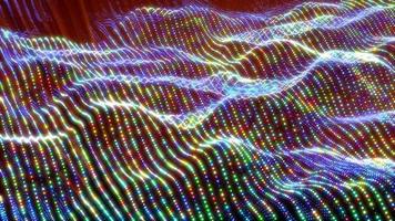 Abstract bright glowing multicolored rainbow waves and lines from particles and dots in the form of a field with a blur effect. Abstract background. Video in high quality 4k, motion design