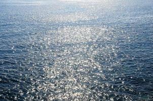 textura de primer plano de agua de mar foto