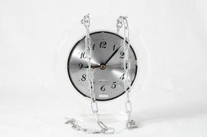 Vintage clock with chains photo