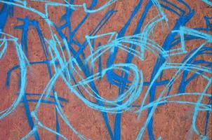 Art under ground. Beautiful street art graffiti style. The wall is decorated with abstract drawings house paint. Modern iconic urban culture of street youth. Abstract stylish picture on wall photo