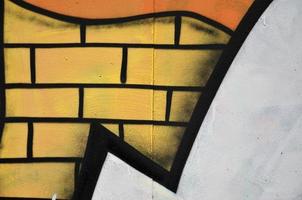 Background image of the wall decorated with colorful abstract graffiti. Street art concept photo