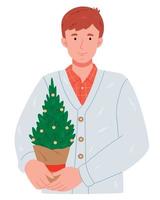 un tipo con estilo en una chaqueta de punto sostiene un árbol de navidad. persona feliz que lleva un árbol de navidad, preparándose para las vacaciones de invierno. vector