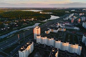 Aerial view of city residential district at sunset photo