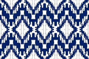 patrón étnico ikat sin costuras en tribal. estampado de adornos étnicos geométricos aztecas. estilo de patrón ikat. vector