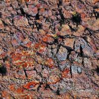 Photo realistic seamless repeatable texture pattern of rusty walls with cracks and lots of structured details.