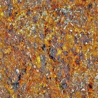 Photo realistic seamless repeatable texture pattern of rusty walls with cracks and lots of structured details.