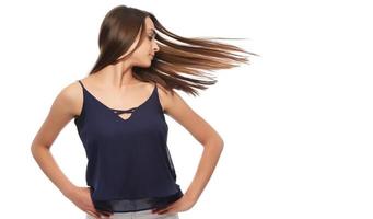 Photo portrait of dreamy girl with long brunette hair flying enjoying wind smiling