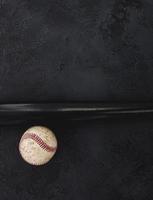 baseball and wooden bat photo