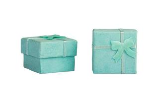 Opened empty blue gift box with a bow on a white background, isolated. photo