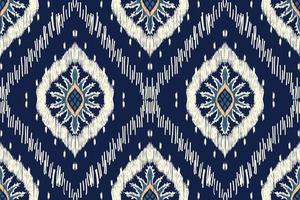 Ikat floral paisley embroidery on navy blue background.geometric ethnic oriental seamless pattern traditional.Aztec style abstract vector illustration.design for texture,fabric,clothing,wrapping,scarf