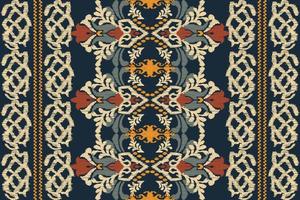 Ikat floral paisley embroidery on blue background.geometric ethnic oriental pattern traditional.Aztec style abstract vector illustration.design for texture,fabric,clothing,wrapping,decoration,scarf.
