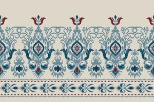 Ikat floral paisley embroidery on gray background.geometric ethnic oriental pattern traditional.Aztec style abstract vector illustration.design for texture,fabric,clothing,wrapping,decoration,sarong.