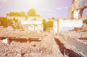 Collapsed industrial multistorey building in daytime photo